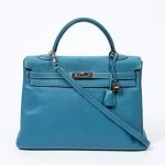 Hermes Kelly Retourne 35 Handbag, c. 2007, in blue clemence calf leather with silvered hardware, opening to a matching blue leather lined interior wit
