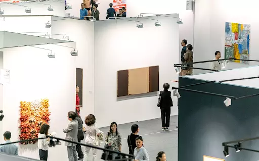 Visitors view artworks at KIAF ART SEOUL. Image courtesy of KIAF ART SEOUL.