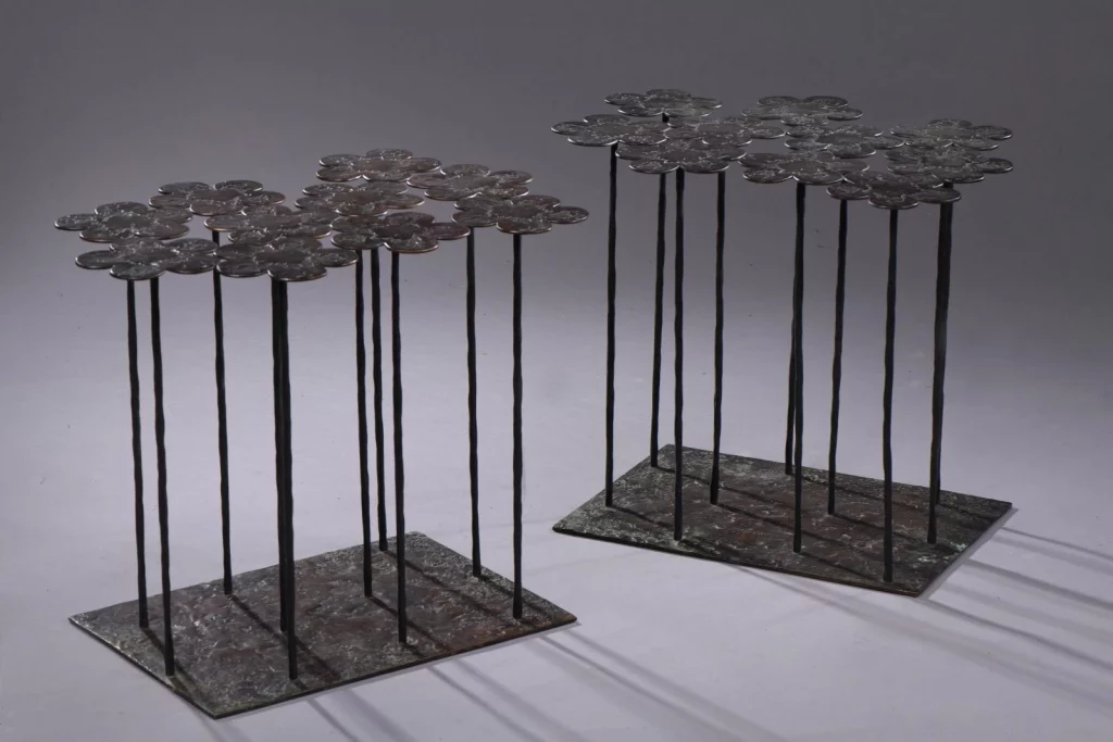 Hubert Le Gall (born 1961), two "Marguerite dix fleurs" tables in bronze with a black patina, 10 daisies rising up from a rectangular base, founder’s mark, signature of the stamp "Le Gall", numbered "EA 1/4" and dated 2007, 50 x 49 x 34.5 cm/19.68 x 19.29 x 13.58 in. Estimate: €10,000/12,000