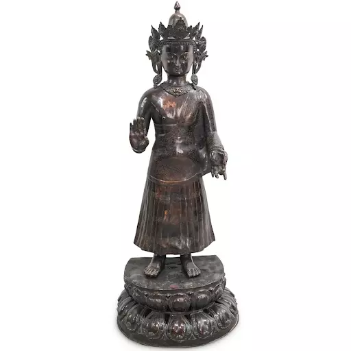 Early Tibetan scale bronze Gautama Buddha statue. Image courtesy of Akiba Antiques.