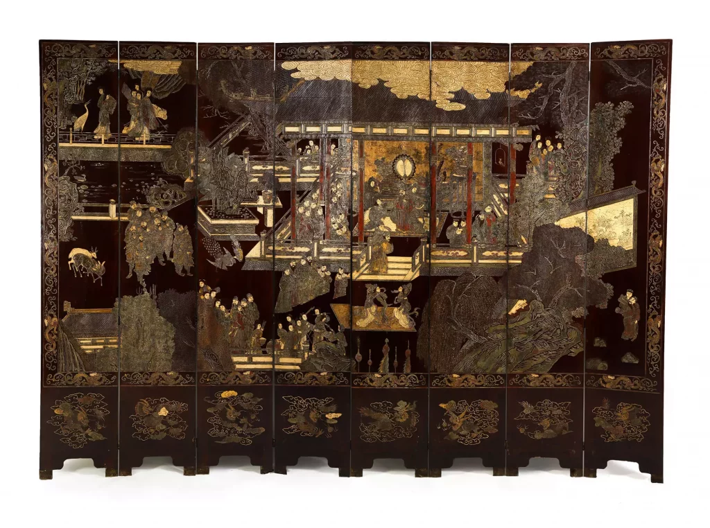 A spectacular eight-fold coromandel lacquer screen with a scene of deer and figures in pavilions, dated to the 24th year of Kangxi (1686) (Estimate: $80,000/100,000)