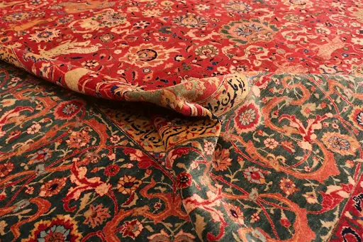 Detail of animal design antique Persian Tabriz rug. Image courtesy of Nazmiyal Auctions.