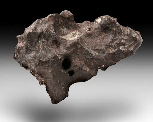 Historical American meteorite– complete sculptural Canyon Diablo, lot #3386. Image courtesy of Bonhams.