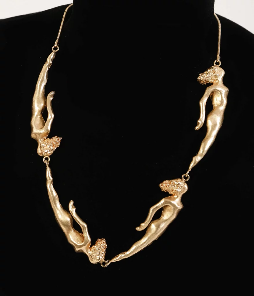 A 14k Gold Swimmer Link Necklace, designed by Carey Boone Nelson
