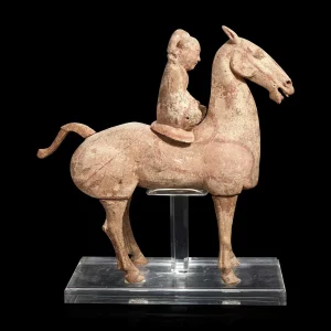 A Chinese large painted pottery figure of a horse and rider Han dynasty