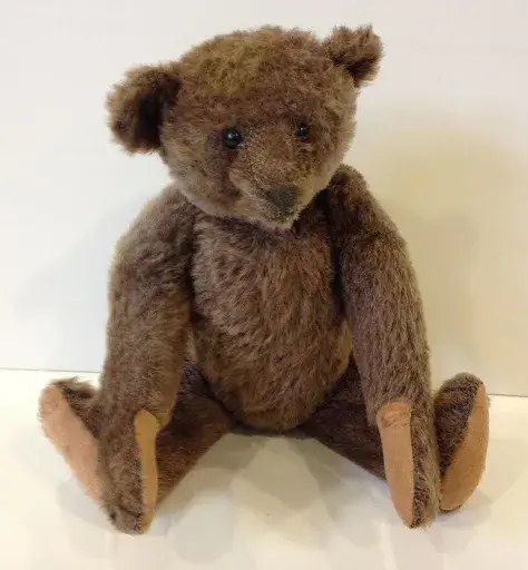 Chocolate-brown Steiff teddy bear circa 1910. Offered at auction last year by Appletree Auction Center. Photo from LiveAuctioneers.