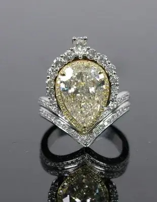 18K WG Custom 3.75 CTTW Fancy Yellow Diamond Ring available in Gallery 63’s June 28th estates auction. Photo courtesy of the auction house.