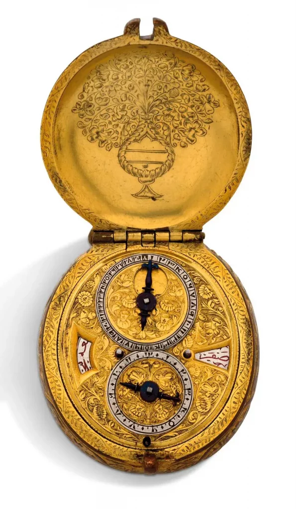 Swiss work, mid-17th century, gilded metal oval astronomical watch made for the Ottoman market, decorated with foliage, flowers, a stylized cockerel in the form of a minaret, signed by the watchmaker in Turkish characters, 8 x 5 cm/3.14 x 1.96 in, gross weight 193.6 g/6.82 oz.
Estimate: €15,000/25,000