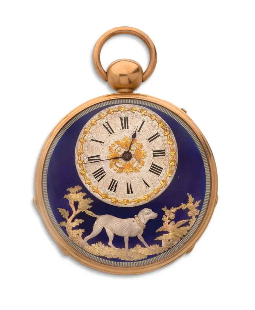 Swiss work attributed to Piguet Meylan, early 19th century, gold watch with chimes, an automaton dog- facing a basket of flowers with two doves- moves its head and reproduces the sound of barking, dial on translucent blue enamel background, diam. 5.55 cm/2.18 in, gross weight 119.4 g/4.21 oz.
Estimate: €20,000/40,000