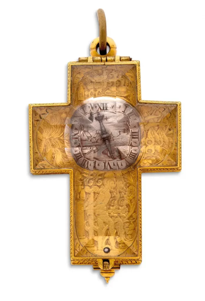 Fonnereau, La Rochelle, mid-17th century, cross-shaped watch, gilded metal and rock crystal, pre-balance spring, silver dial engraved with a lake scene, floral and foliage motifs, Christ, a lantern, a cockerel and a jar, signed, 4.65 x 3.35 cm/1.83 x 1.32 in, gross weight 47.2 g/1.66 oz.
Estimate: €15,000/20,000