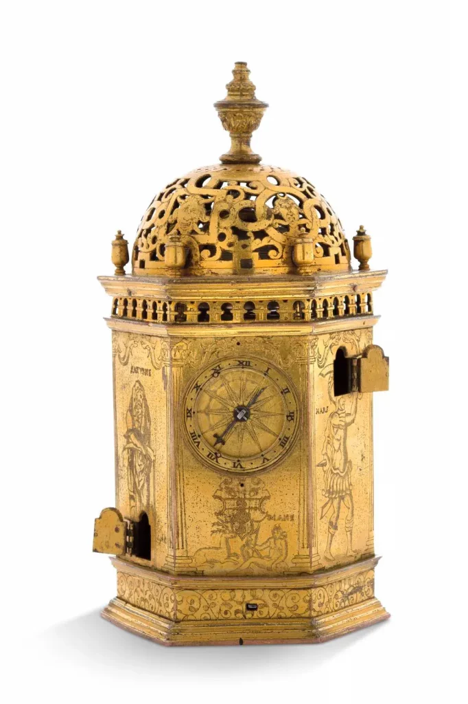 P. Plantard, Abbeville, mid-16th century, gilded copper table clock shaped like a hexagonal tower with the arms of Guillaume Bailly, Comte de La Ferté Aleps (1519-1582), engraved with Diana the Huntress, Mars, Mercury, Jupiter, Venus and Saturn, 18 x 9.1 x 8 cm/7.08 x 3.58 x 3.14 in.
Estimate: €20,000/30,000