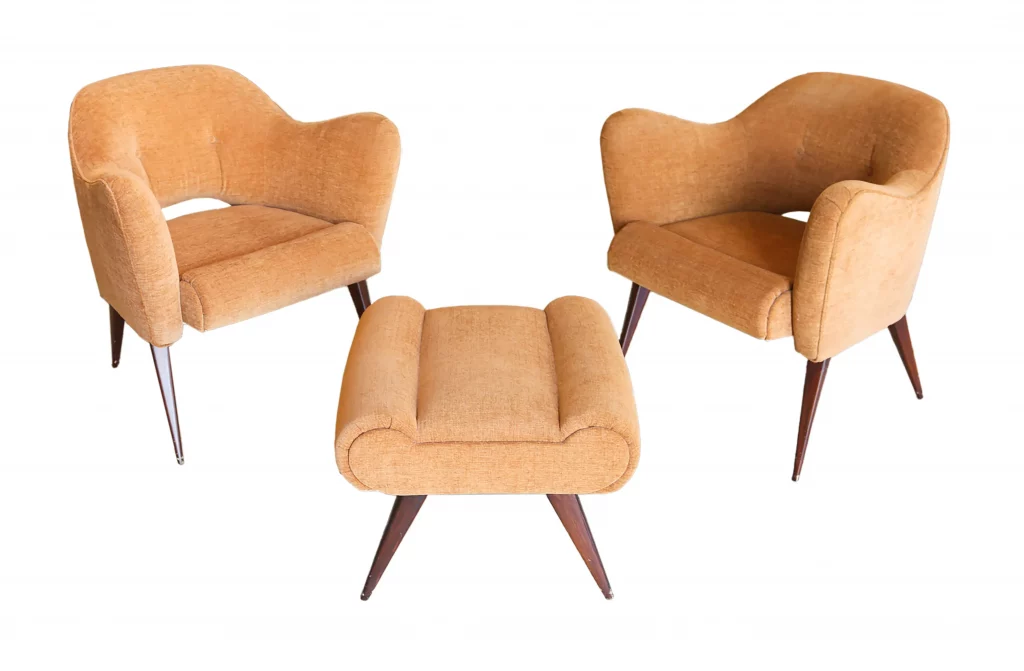 A pair of armchairs and ottoman by Eero Saarinen for Knoll (Estimate: $500/800)