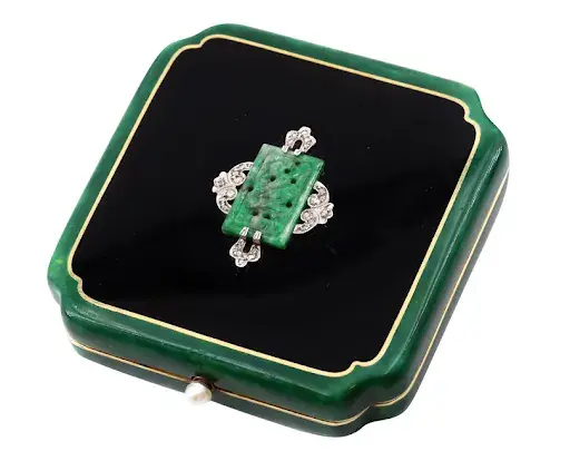 Art Deco 18-karat gold enamel jade diamond vanity case. Image courtesy of WinBids Auctions.