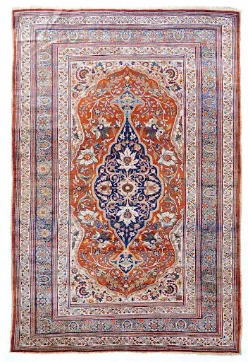 An antique Heriz rug. Image courtesy of 1stbid. 