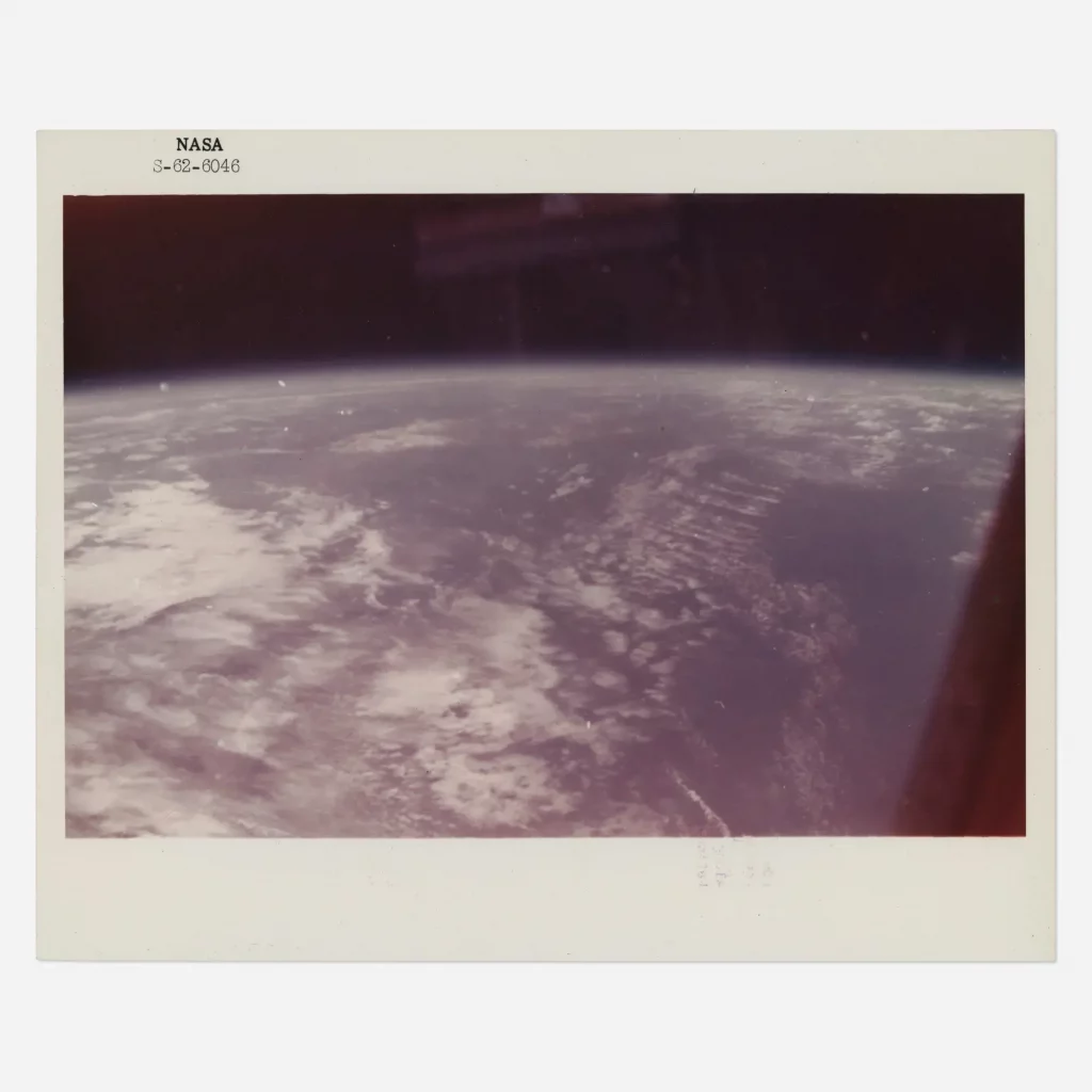 First human-taken photograph from space: Blue Earth horizon and black sky of space from Friendship 7, John Glenn [Mercury Atlas 6], 20 February 1962
$5,000-7,000