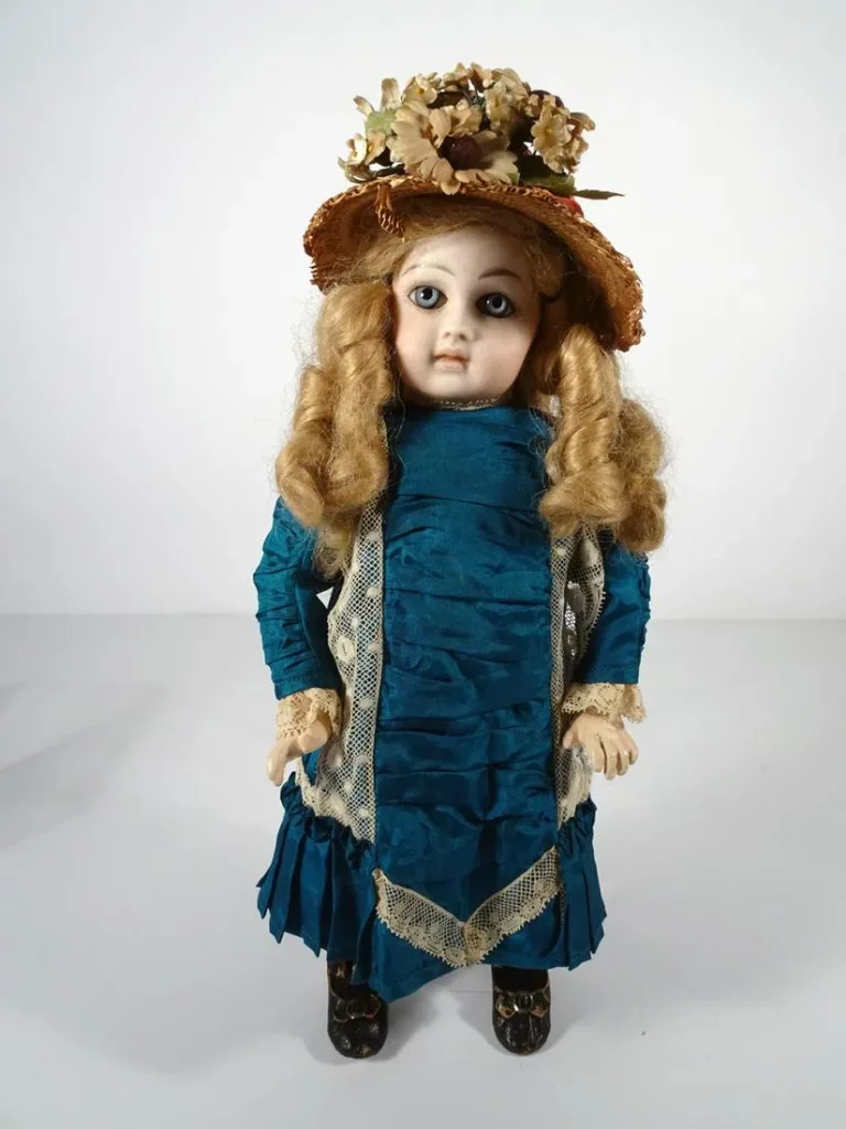 Jumeau bisque head doll, stamped Jumeau Medaille d’Or Paris, 13in high. Estimate $2,000-$4,000

