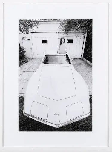 Lot #10, Julian Wasser's (b. 1938) Joan Didion Standing in Her Stingray Corvette. Image courtesy of Stair.