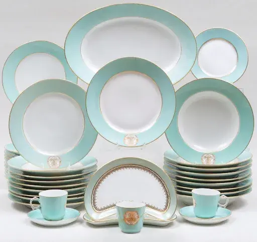 Lot #207, a porcelain monogrammed part dinner service. Image courtesy of Stair.