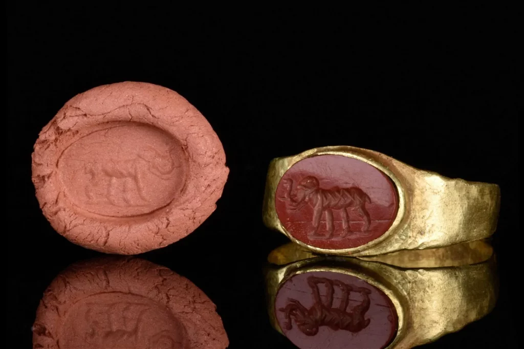 Circa 100 BC to 100 AD Roman gold and carnelian intaglio ring depicting an elephant in profile with long trunk and well-defined legs, tail, ears. Estimate £1,500-£3,000 ($1,840-$3,680) 