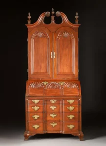 The Important Corlis-Bowen Family Chippendale Block and Shell-Carved and Figured Mahogany Desk-And-Bookcase