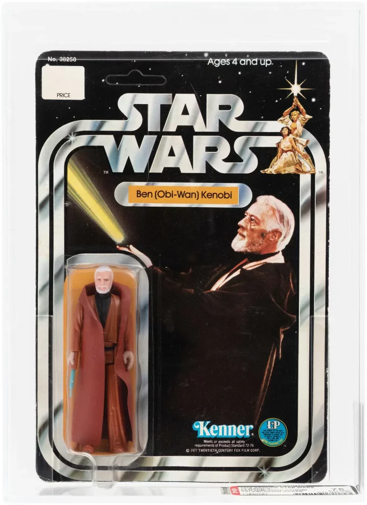 Encased Star Wars (1978) 3.75in Ben (Obi-Wan) Kenobi 12 Back-A double-telescoping lightsaber action figure with SKU on footer denoted earlier production, AFA 75 Ex+/NM. Extremely rare and only the third carded specimen of its type ever to be offered by Hake’s. Sold for $79,178