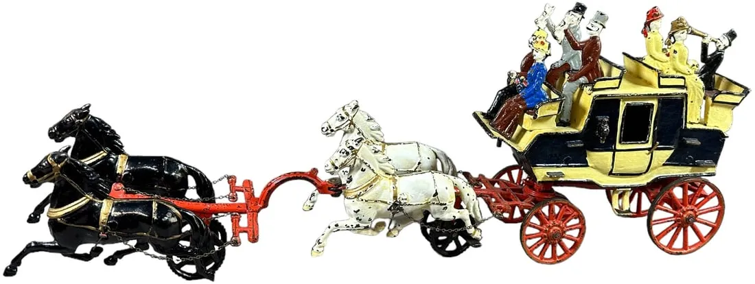 Carpenter (American) cast-iron Tally Ho horse-drawn coach. All original, including the removable figures. Size: 26in long. Finest example known. Provenance: Curtis and Linda Smith collection, Bob and Jackie Stewart collection, Bernard Barenholtz collection. Finished as top lot of the sale at $120,000 against an estimate of $50,000-$75,000