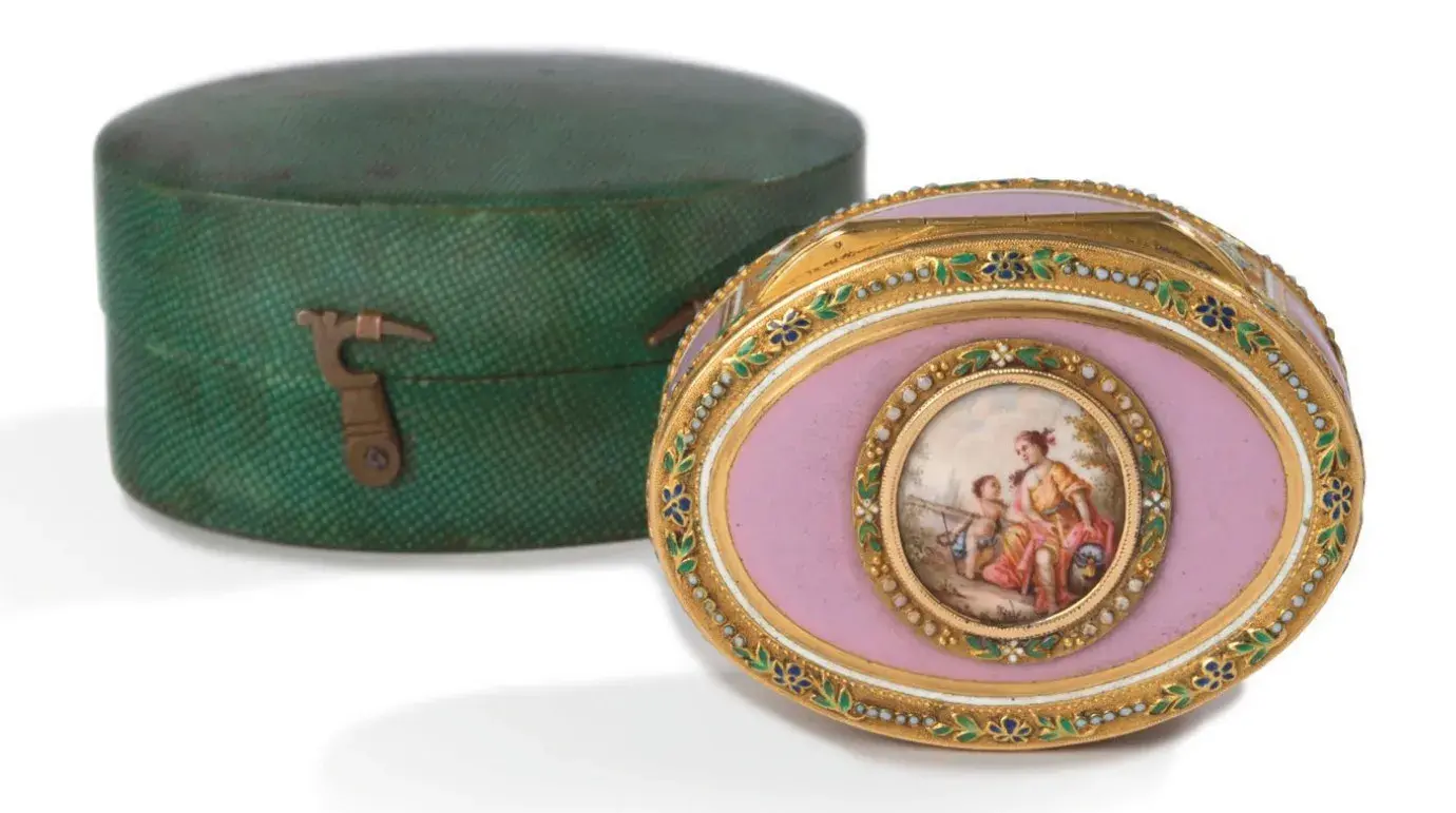 Paris, 1756-1757. Oval container for use as a snuffbox or patch box, yellow gold body, purple enamel plates on all sides, lid with an enameled medallion of a mythological scene, 2.2 x 5.9 x 4.3 cm/0.8 x 2 x 1.6 in., gross weight 78 g/2.8 oz. Neuilly, December 6, 2023. Aguttes auction house. Sold for €8,710