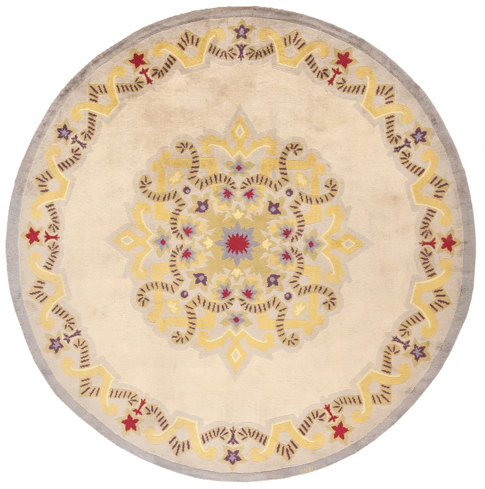 An antique round French Art Deco rug by Leleu. Image courtesy of Nazmiyal Auctions. 
