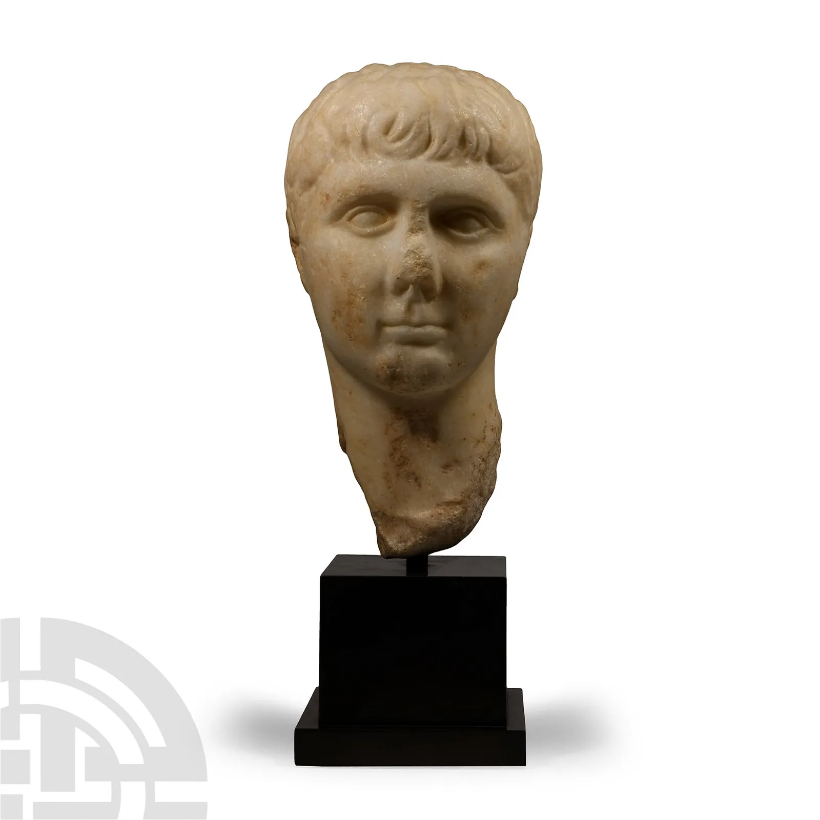 Roman marble portrait head modeled in the round of Gaius Caesar Vipsanianus (20 B.C.-4 A.D., born to Julia, daughter of Augustus Caesar, and the emperor’s advisor Marcus Vipsanius Agrippa; later adopted by Augustus), likely created in 1 A.D. to celebrate Gaius’ consulship. Height: 48cm (19in) inclusive of custom stand. Weight: 17.4kg (38lbs 6oz). Cf. J.M.C. Toynbee, ‘Roman Historical Portraits,’ London, 1978; E. La Rocca, 'Rom als Vorbild für Pompeji: Aspekte der Kolonisierung,' and many European museum publications. Provenance: Acquired on London art market in 1970s by previous owner’s father; Christie’s London, April 25, 2007; London private collection. Includes academic report by Dr Raffaele D’Amato. Estimate: £30,000-£40,000 ($38,220-$50,960)