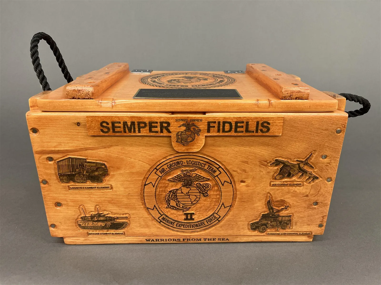 Wood ammunition crate with presentation plaque from ‘Marines & Sailors, Marine Corps Combat Development Command’ to ‘General Alfred M. Gray Jr., USMC Ret.’ To commemorate Marine Corps’ 234th birthday. Emblazoned with Marine Corps imagery, emblems and the motto ‘SEMPER FIDELIS.’ Size: 11½ in x 19¼ in x 11¾ in. Provenance: Estate of 29th US Marine Corps Commandant Four-Star General Alfred M. Gray Jr. (American, 1928-2024). Estimate: $100-$200
