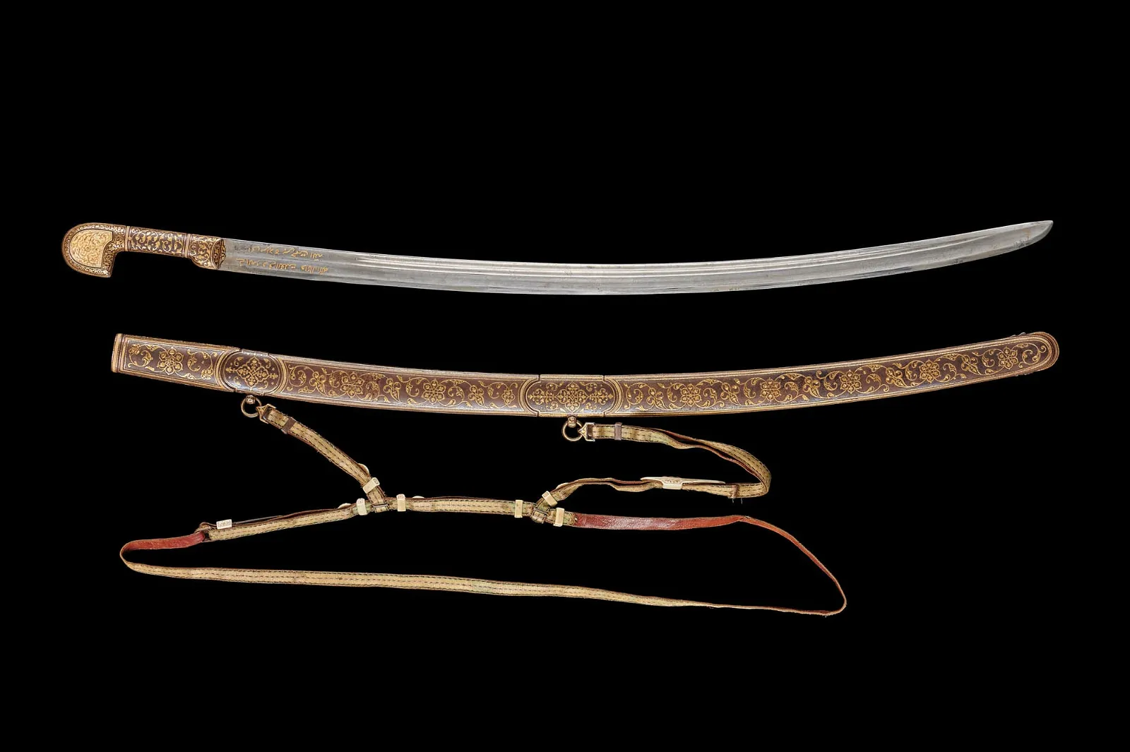 Extremely fine-quality Caucasian shashka that belonged to Nicholas II, Tsar of Russia, given to him when he was Tsesarevich (heir apparent). Research suggests it was presented to Nicholas during a tour of the Caucasus with his father Tsar Alexander III, in 1888. Arabic inscription in gold on blade near hilt: ‘(M)ay the dominance of the owner of this sword grow, and his life, and his greatness, and may Allah bless his family, and he will achieve his goal.’ Monogrammed with the letters ‘N’ and ‘A’ (for Nicholas Alexandrovich), which are surrounded by a golden laurel and surmounted by the Imperial Russian crown. Wonderfully decorated scabbard with calligraphic Arabic inscription that translates to ‘Abdullah worked,’ the equivalent of a European maker’s mark. Only royal sword ever offered for public sale. Provenance: Property of a European collector; ex Eugene Mollo collection, Switzerland. Opening bid: £1,200,000 ($1,516,300)
