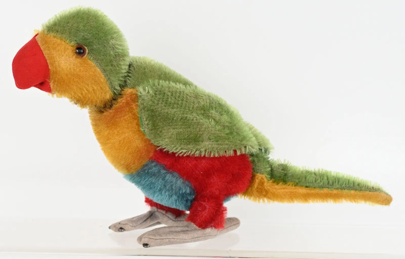 Lot #0113, a standing 12-inch yes-no parrot, is estimated at $400 to $600. Image courtesy of Milestone Auctions.
