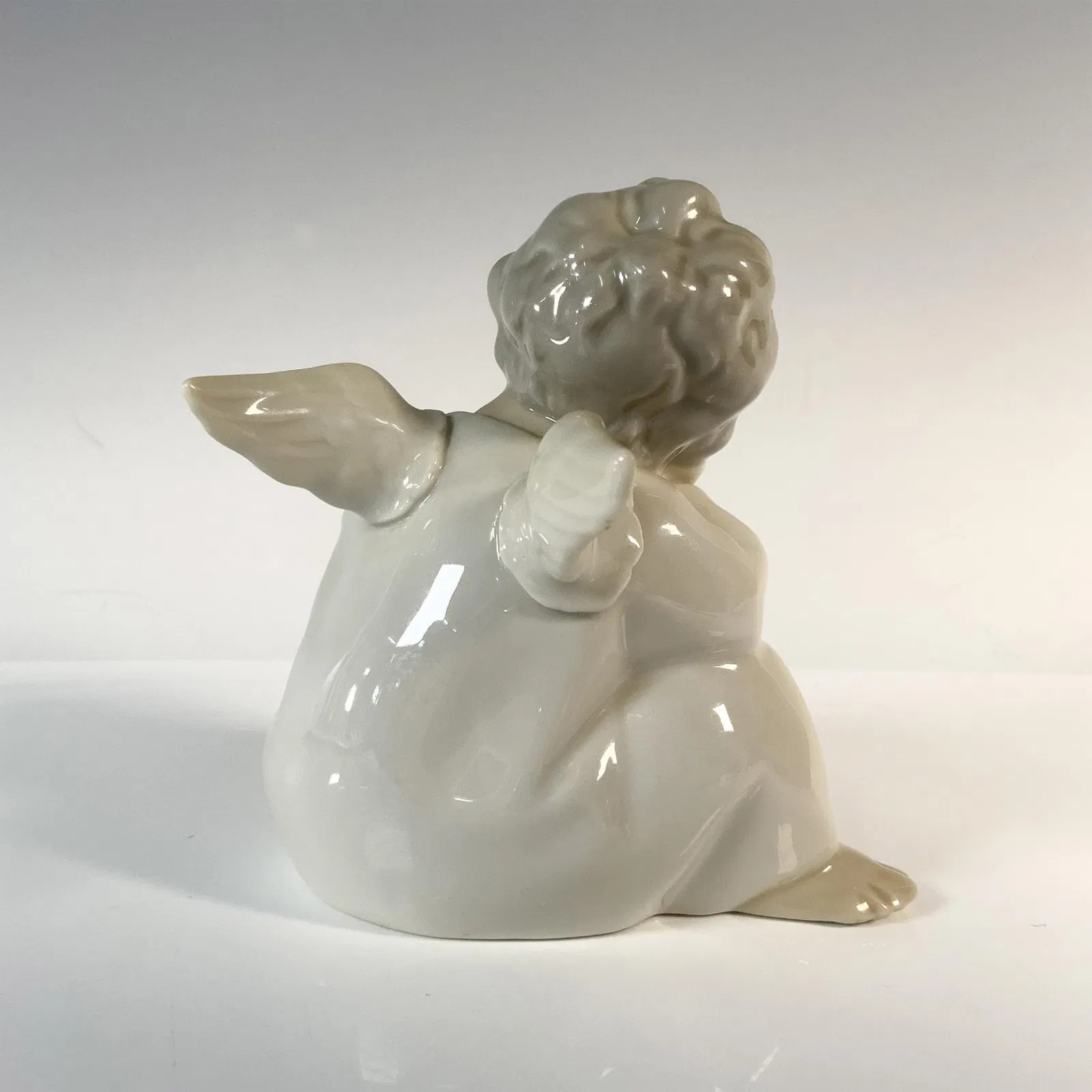 Angel Thinking 1004539 - Lladro Porcelain Figurine