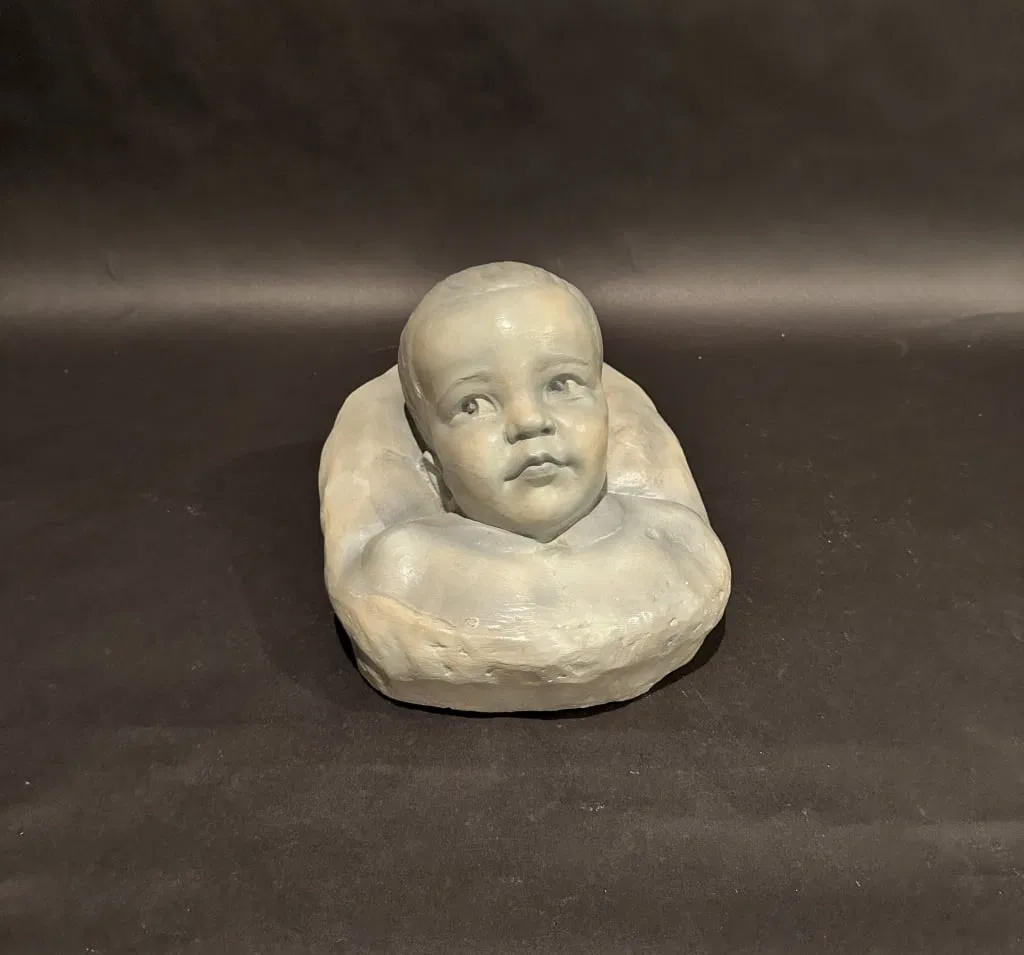 Augusta Christine Fells (Moore) Savage (African-American, 1892-1962), painted red clay/terracotta relief bust of an infant. Signed and dated 1942. Extensive biography of the artist appears in Regenia A. Perry’s 1992 book ‘Free Within Ourselves: African-American Artists in the Collection of the National Museum of American Art (Washington, D.C.).’ While in NYC at the peak of the Harlem Renaissance, Savage created busts of W.E.B. DuBois and Marcus Garvey. She was the first person in the U.S. to open a gallery dedicated to African American Art, and two of her works were exhibited at the Grand Palais in Paris. Size: 9in x 12in x 10in. Estimate: $4,000-$6,000