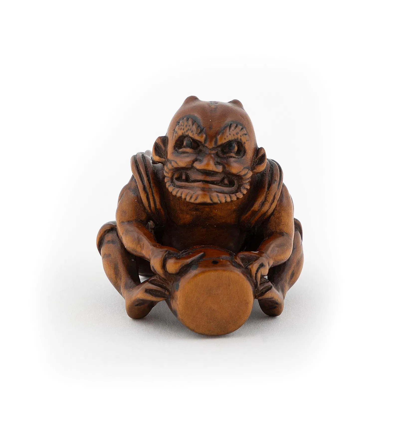 Lot #0631, a carved wood netsuke by Ikkosai, is estimated at $10,000 to $12,000. Image courtesy of Eldred’s. 
