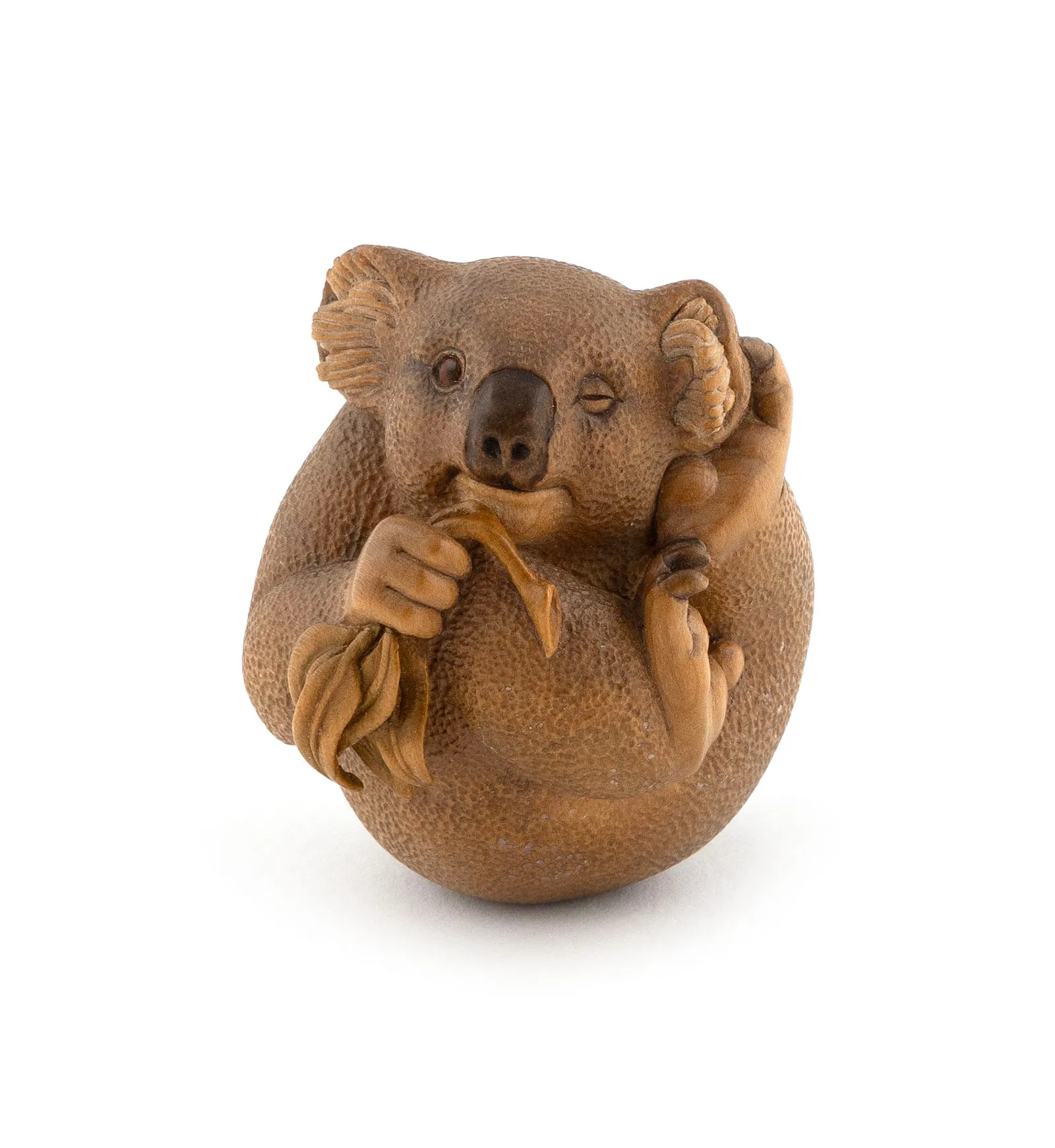 Lot #0727, a carved boxwood netsuke by Susan Wraight, is estimated at $2,000 to $4,000. Image courtesy of Eldred’s. 
  
