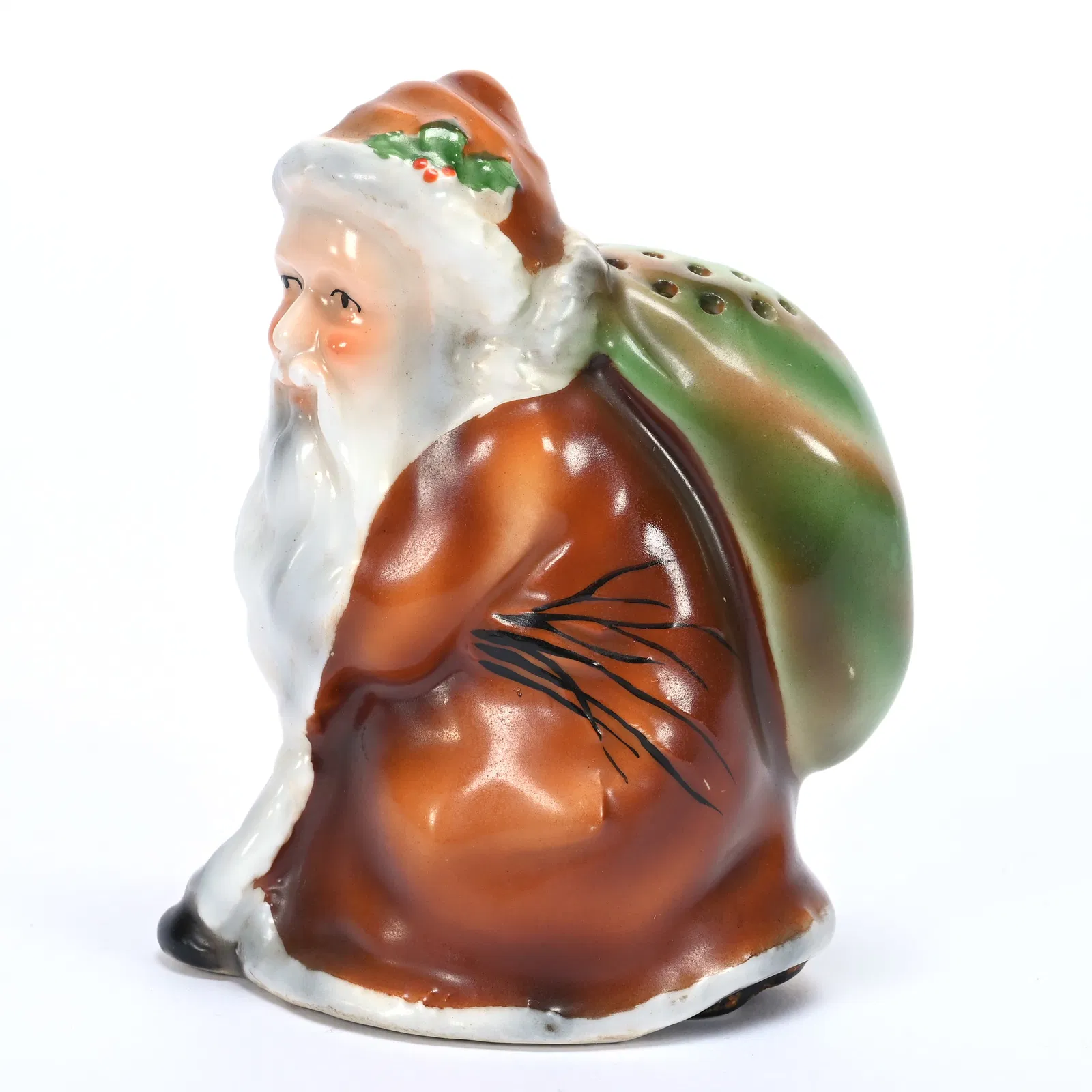 A Santa Claus hatpin holder was estimated at $1,500 to $2,000 and sold for $9,600. Image courtesy of Woody Auction LLC.
