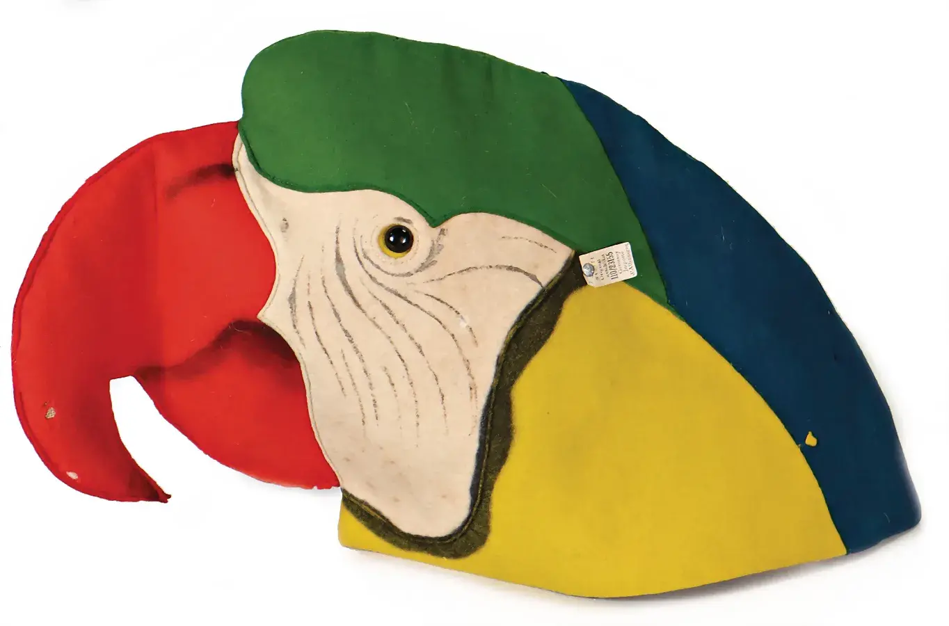 Lot #156, a festive hat in the form of a parrot head, has an opening bid of EUR 180. Image courtesy of Ladenburger Spielzeugauktion. 
