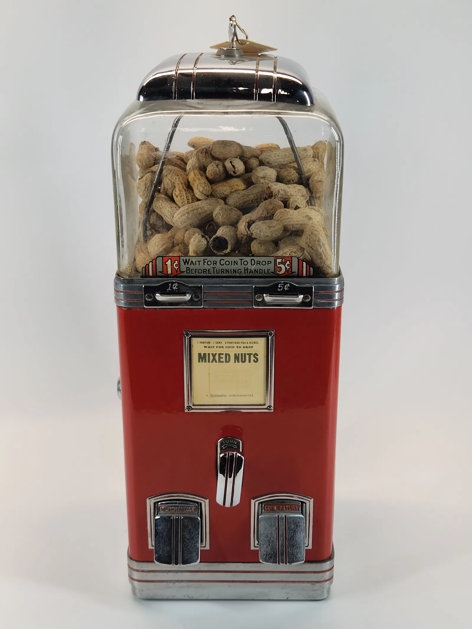 Lot #51, a mixed nuts vending machine, was estimated at $100 to $200 and delivered $400. Image courtesy of Gehman Auctions. 
