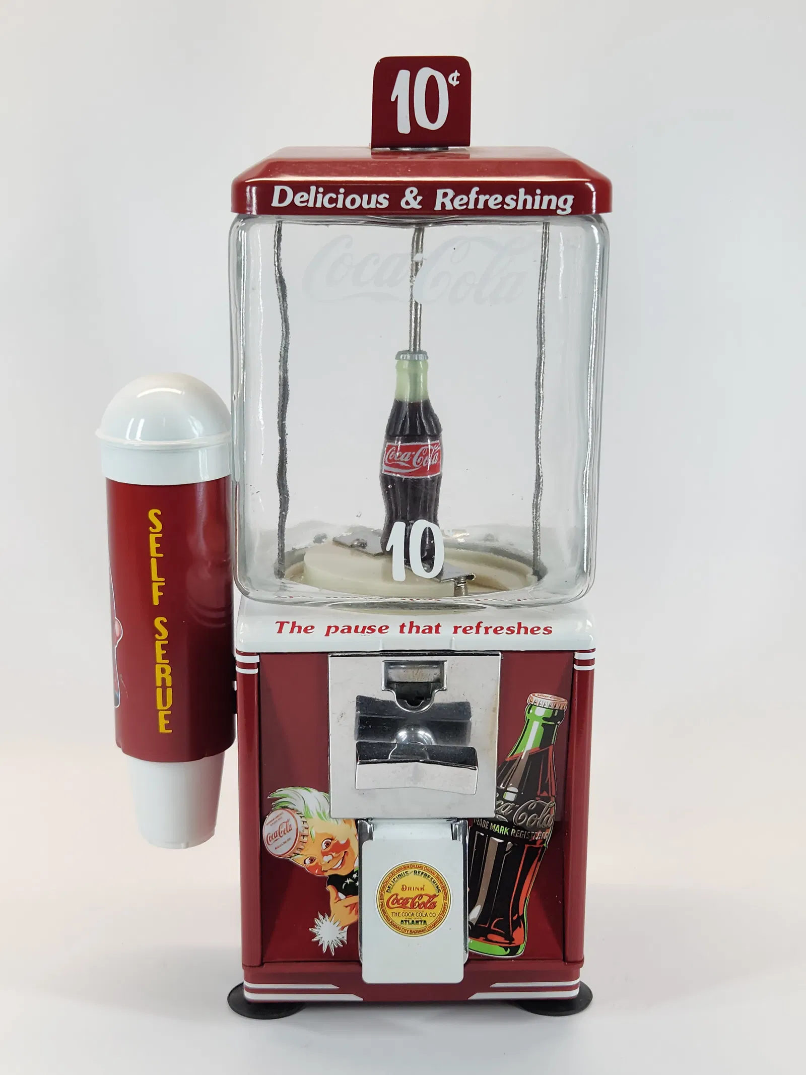 Lot #61, a Coca-Cola gumball machine, was estimated at $100 to $200 and made $1,353. Image courtesy of Gehman Auctions.
